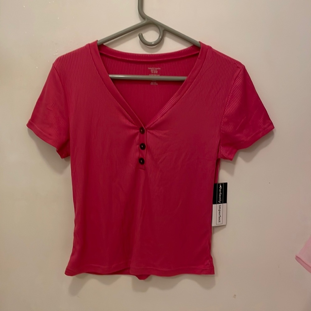 Pink button up shirt deep cleavage stretchy fabric